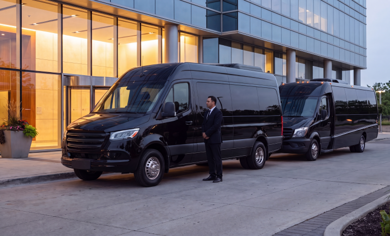 Black Sprinter and mini coach staged together for a private student group vehicle comparison
