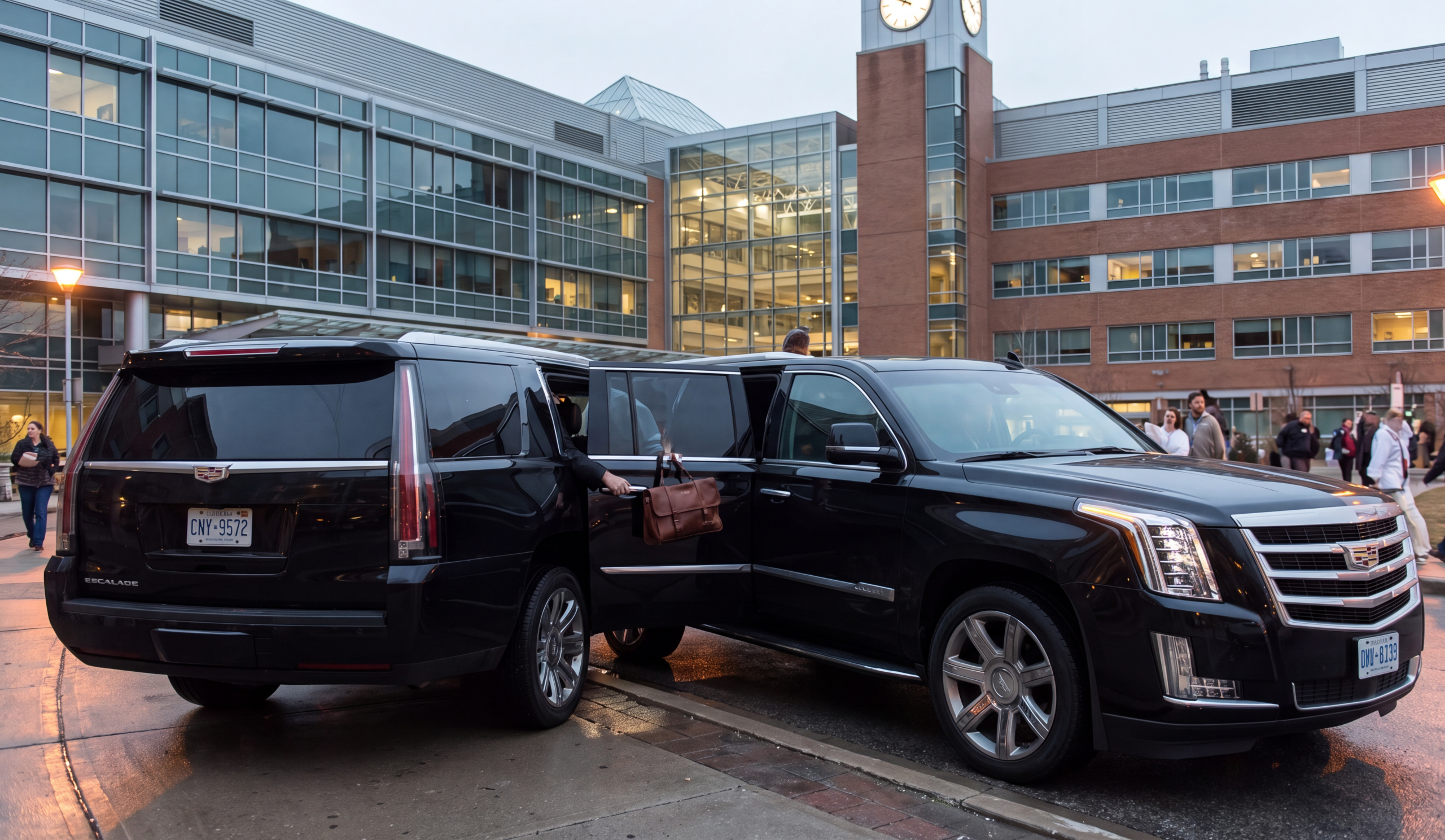 Black Cadillac Escalade ESV waiting at a hospital-administration kerb near Victoria Hospital, London Ontario
